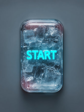 A glowing start button appears surrounded by ice in a sleek, contemporary environment, suggesting a blend of technology and freshness.の素材