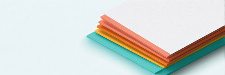 A stack of vibrant craft paper in various colors is arranged neatly, inviting creativity and various artistic projects.の素材