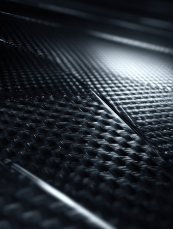 The close-up showcases a sophisticated dark surface with intricate patterns, emphasizing a contemporary aesthetic.の素材