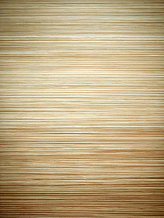 A textured surface with horizontal lines in light brown. Evokes a sense of natural warmth and understated elegance.の素材