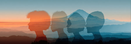 Multiple silhouettes blend into a stunning sunset over mountains, showcasing depth and tranquility in a peaceful natural setting.の素材