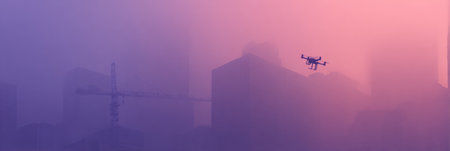 Drone navigates through a misty city skyline at sunset, highlighting the contrast of buildings and soft colors in the sky.の素材