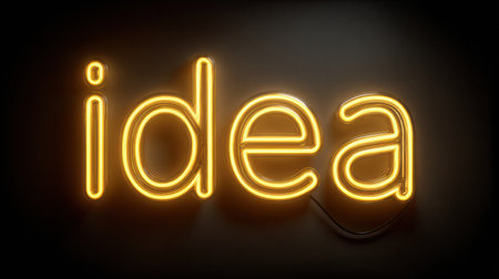 Neon sign illuminating the word idea in bright yellow light against a dark backdrop during evening hours.の素材