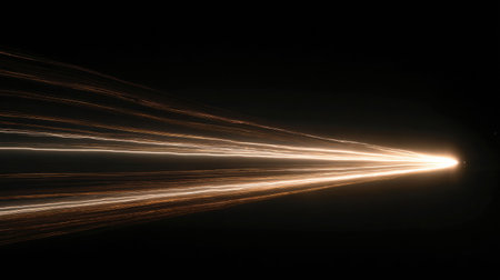 Rocket launch produces vibrant, luminous exhaust ribbons against the dark night, showcasing beautiful long-exposure trails and space for text.の素材