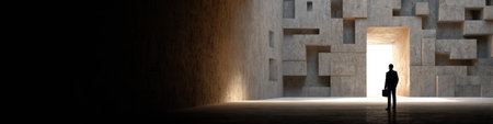 A businessman stands at the entrance of a maze, surrounded by intricate walls, contemplating problem-solving and decision making in a dramatic light.の素材