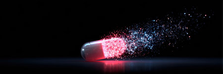 A capsule bursts open, allowing vibrant, glowing particles to escape, vividly illustrating the energy and power of vitamins as they disperse.の素材
