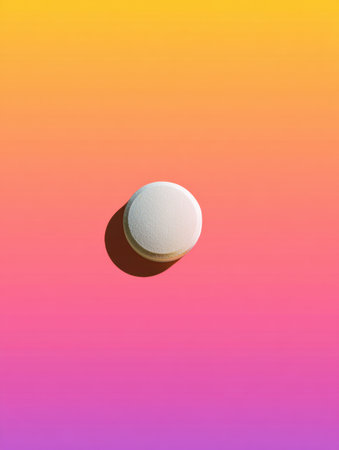 A white pill is placed at the center against a smooth gradient background, evoking feelings of clarity and focus in a minimalistic design.の素材