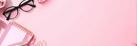 Flat lay of stylish glasses, a notebook, and a pen on a pastel pink surface, creating a vibrant workspace for brainstorming or writing.の素材