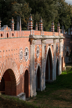 Exploring the Intricate Architecture of Tsaritsynos Grand Bridge Structure Surrounded by Lush Greeneryの写真素材