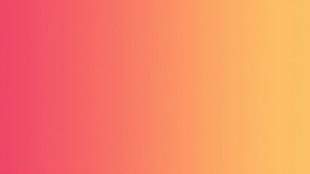 A vibrant gradient of coral colors fills the sky at sunset, creating a warm atmosphere during the evening hours at a scenic spot.の素材