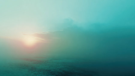 A hazy blue background fills the open space as soft light shines from the horizon during early morning hours.の素材