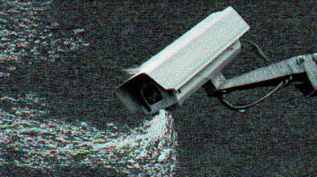 CCTV camera shows a hacked feed with glitches and a clear indication of a security breach in a digital format.の素材