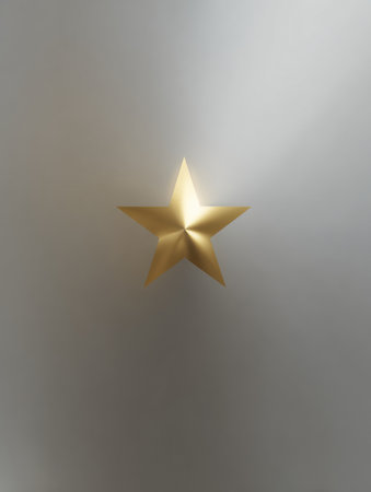The design features a golden star shape with soft blur around the edges, leaving an open space in the center suitable for adding text or graphics.の素材