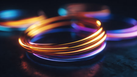 Rings glow with vibrant colors on a dark surface, creating a festive atmosphere for holiday events in a uae-inspired style.の素材