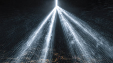 Bright light rays extend into the night sky, symbolizing memory and remembrance over the illuminated city below, creating a reflective scene.の素材