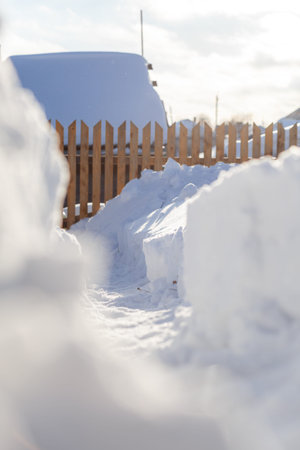 Clearing snow after a big snowfall in winter.