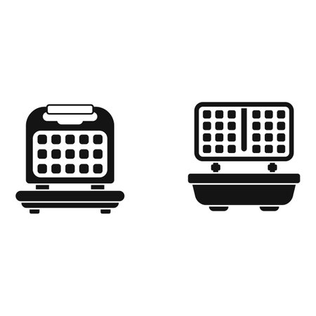 Black vector icons depicting a laptop and a waffle iron, symbolizing technology and cookingのイラスト素材