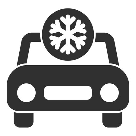 Simple black and white icon of a car with a snowflake above it, indicating winter driving conditionsのイラスト素材