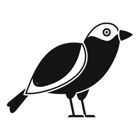 Simple icon of a small bird with big eye and short beak standing stillのイラスト素材
