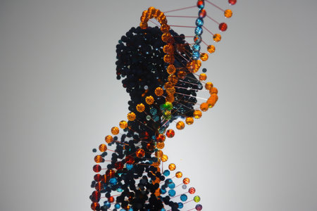 Creative representation of a dna double helix made with colorful beads and wires, isolated on a light backgroundの素材