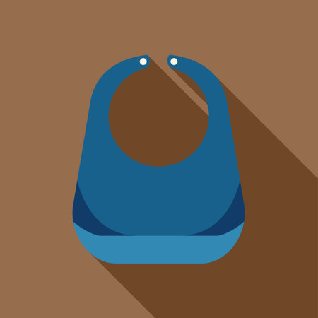 Blue baby bib lying on brown surface with long shadowのイラスト素材