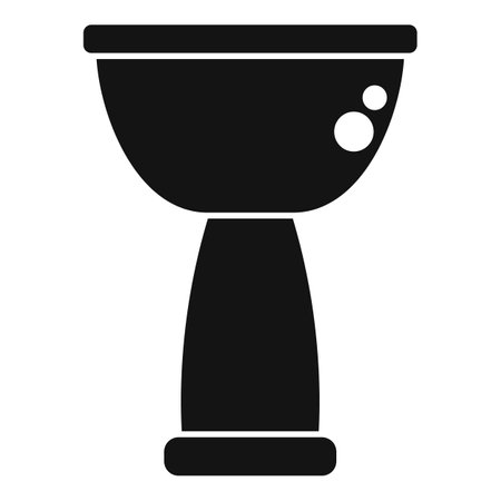 Simple black and white icon of a traditional african djembe drumのイラスト素材