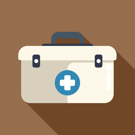 White first aid kit closed, showing a blue cross symbol, in flat design with long shadowのイラスト素材