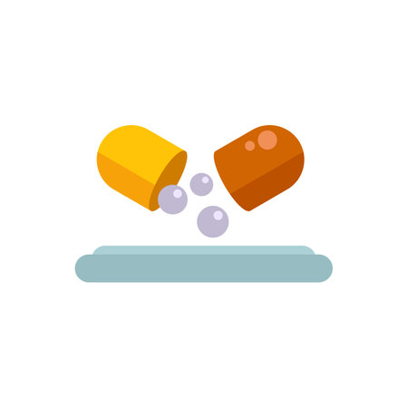 Open yellow and brown pill capsule releasing tiny white balls on a surfaceのイラスト素材