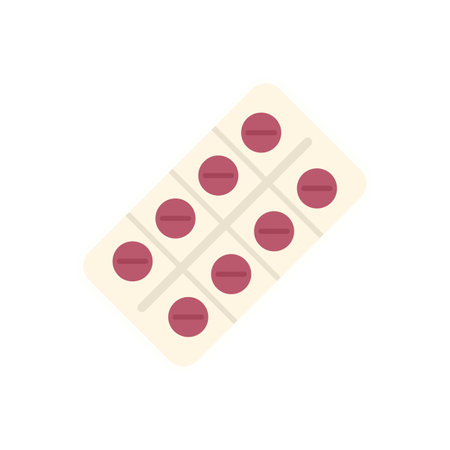 Blister pack containing round pink pills is lying on a white backgroundのイラスト素材