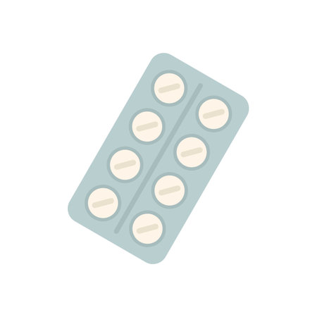 Blister pack containing round white medical pills is lying on a white backgroundのイラスト素材