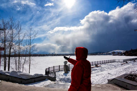 View of quay wharf embankment Nizhny Tagil City. Winter. Sunの写真素材