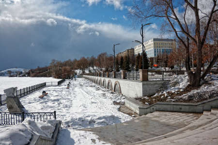 View of quay wharf embankment Nizhny Tagil City. Winter. Sunの写真素材