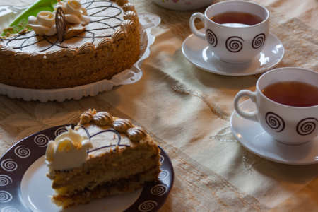 Tea black Indian tea with cake and fruitの写真素材