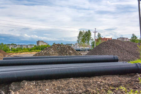 Corrugated water pipes of large diameter prepared for layingの写真素材
