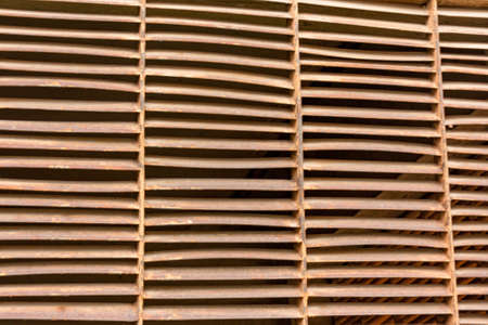 Metal vents on the side of a building.の写真素材