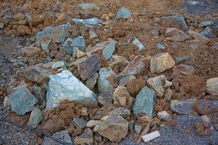 Texture of large and small granite stones close-up