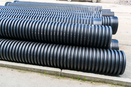 Corrugated water pipes of large diameter prepared for layingの写真素材
