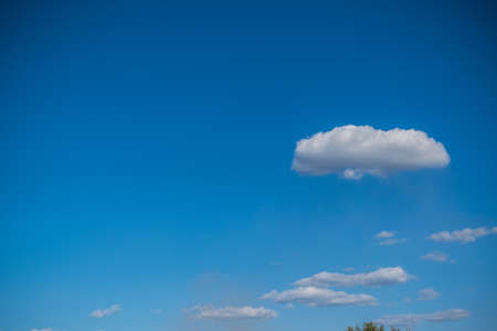 White cloud against the blue summer skyの写真素材