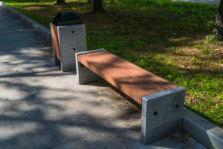 Beautiful new bench in the city parkの写真素材
