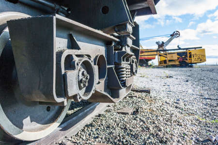 Ancient steam locomotive front view on sky backgroundの写真素材