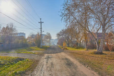 A sunny autumn day the street of a small Russian town
