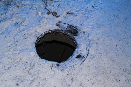 Outdoor sewer on the sidewalk