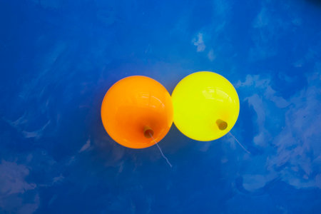 Fragment of the ceiling with colorful balloons in a children's cafeの写真素材