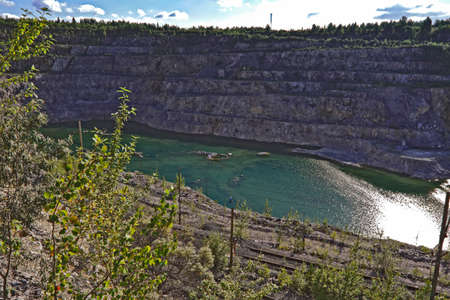 Top view of a large quarry dolomite with water