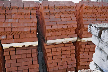 Red brick in piles at the factory prepared for shipment