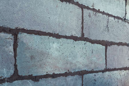 old concrete block wall background texture close-up