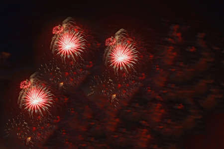 Brightly colorful fireworks and salute of various colors in the night sky