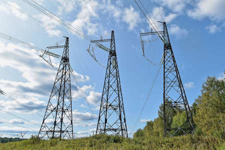 Power line support against the clear blue sky.