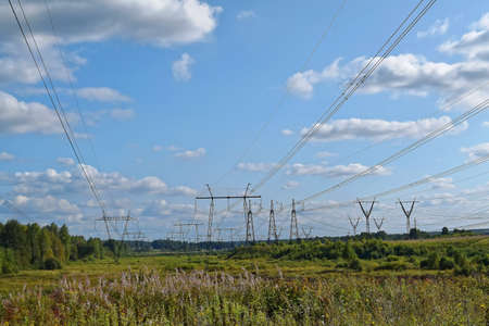 Power line support against the clear blue sky.