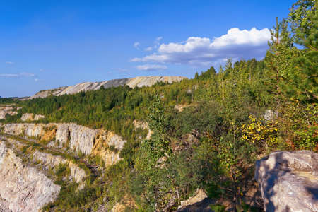 A large old quarry for dolomite mining flooded with groundwater from above